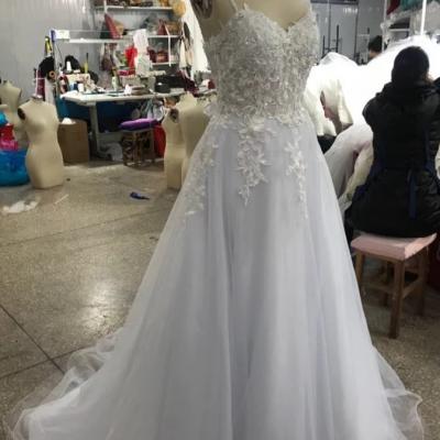 Robe de mariée sur mesure fine bretelle 