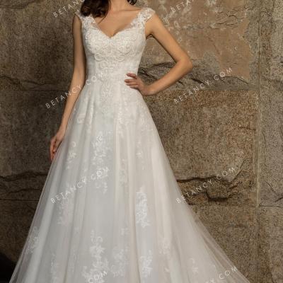 Beaded cap sleeve lace and tulle wedding dress 1