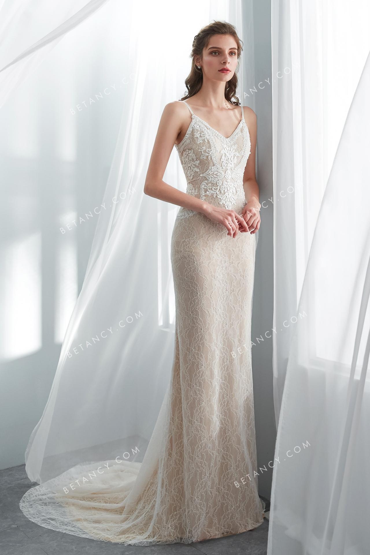 Beautiful lace appliqued champagne modern wedding dress 1