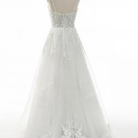 Corset bodice with subtle lace appliques adorned bridal gown 6