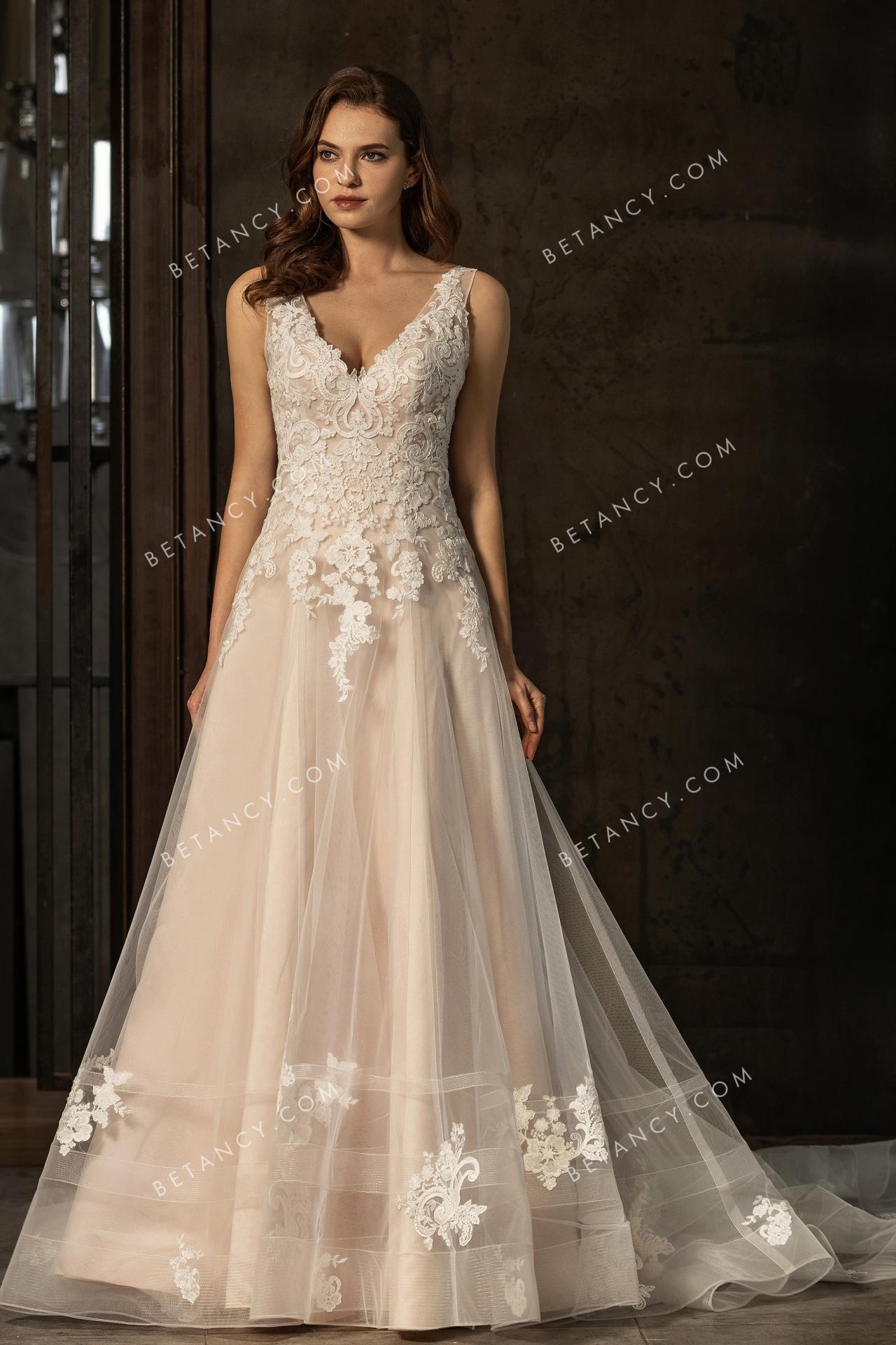 Elaborate embroidered lace pink nude wedding dress 1