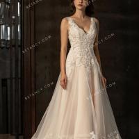 Elaborate handmade wholesale pink nude wedding dress with a graceful v neckline 2