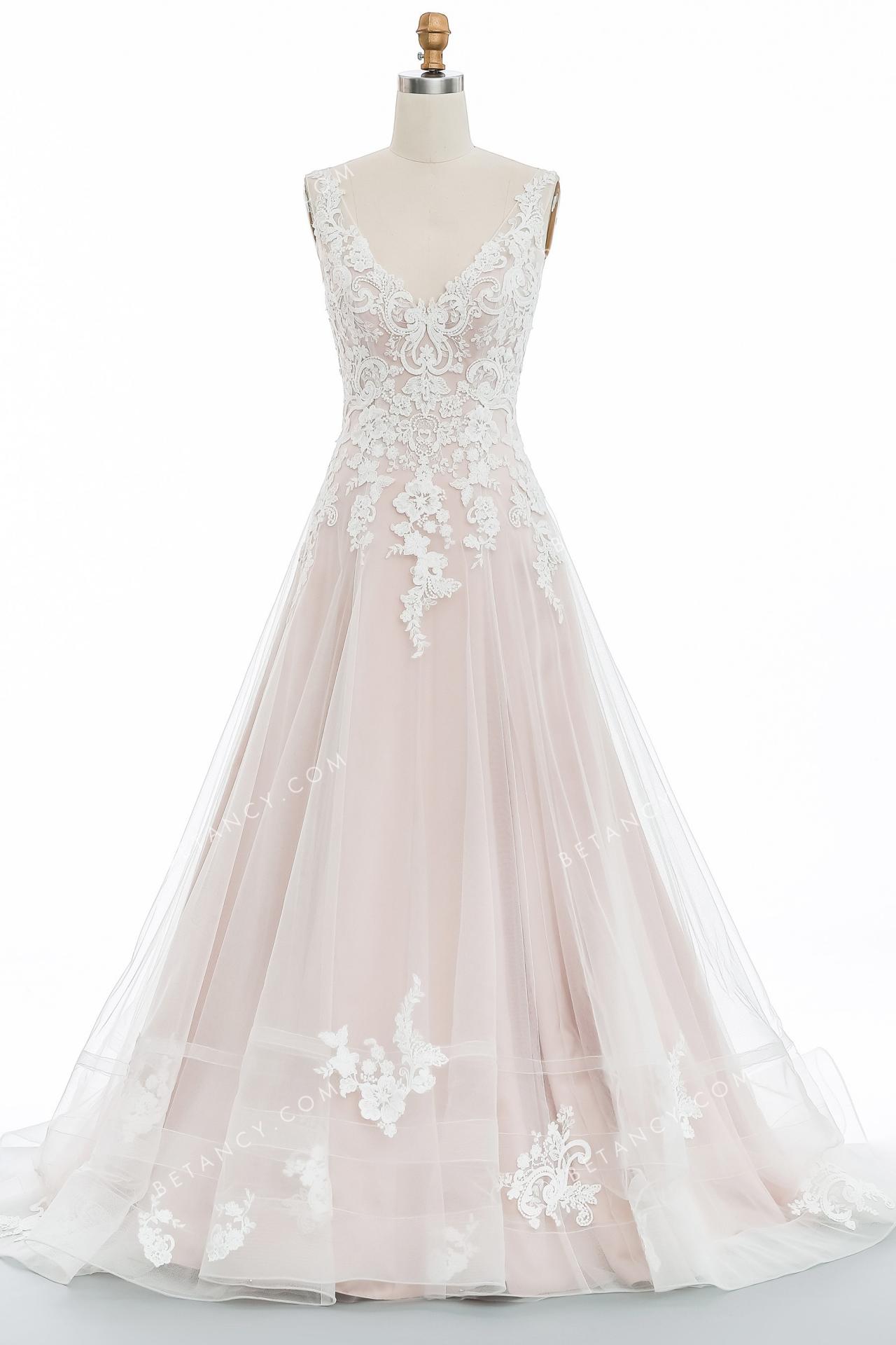 Elaborate handmade wholesale pink nude wedding dress with a graceful v neckline 4