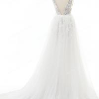 Fit and flare lace wedding dress with detachable overskirt 12