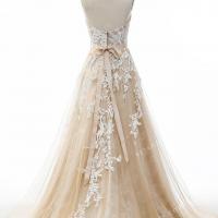 Handmade crema wedding dress with a ruffled horsehair chapel train 6