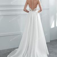 Pearl buttons illusion back flowing organza wedding dress 3