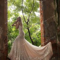 Shimmery beaded lace with dusty rose underneath bridal gown 6