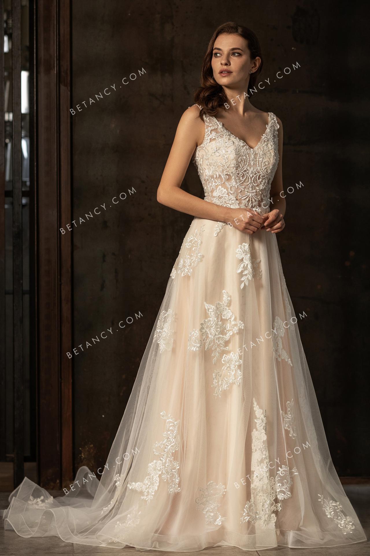 Sophisticated champagne bridal gown with shoulder straps v neckline 2