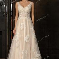 Sophisticated lace appliqued champagne bridal gown 1