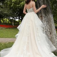 Wedding gown is accented in shimmery embroidered appliques 4